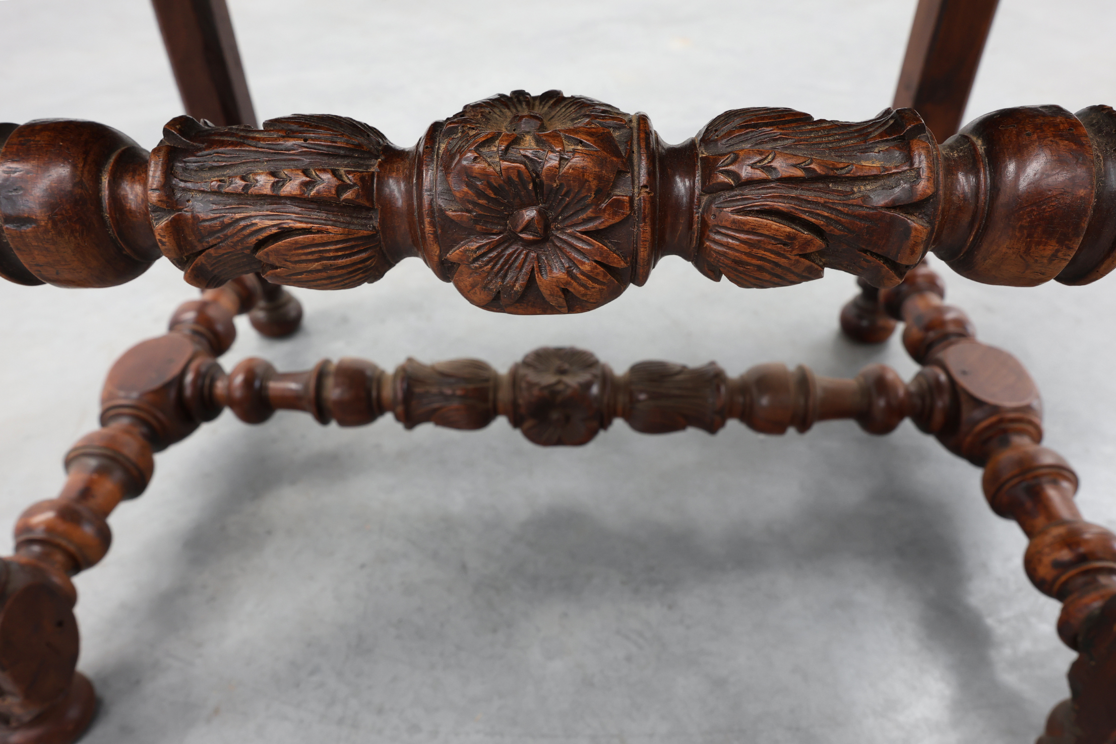 Louis XIII walnut stool with carved turned stretchers and upholstered seat, France, 17th centurythumbnail